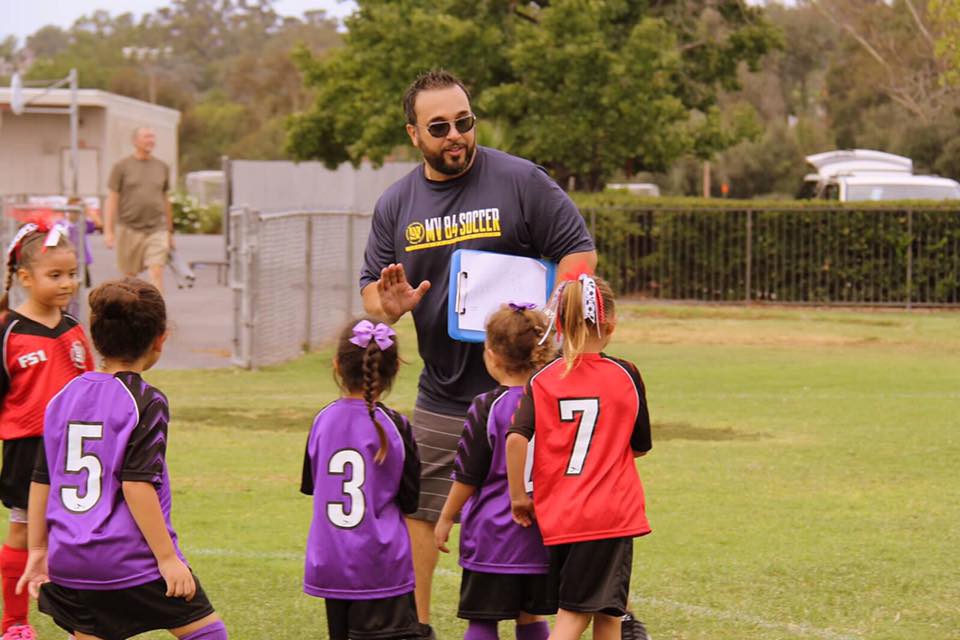 James Assali coaching youth soccer - community involvement and athletics