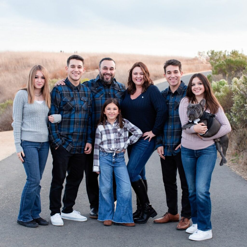 James Assali with his wife Stephanie and six children — family photo